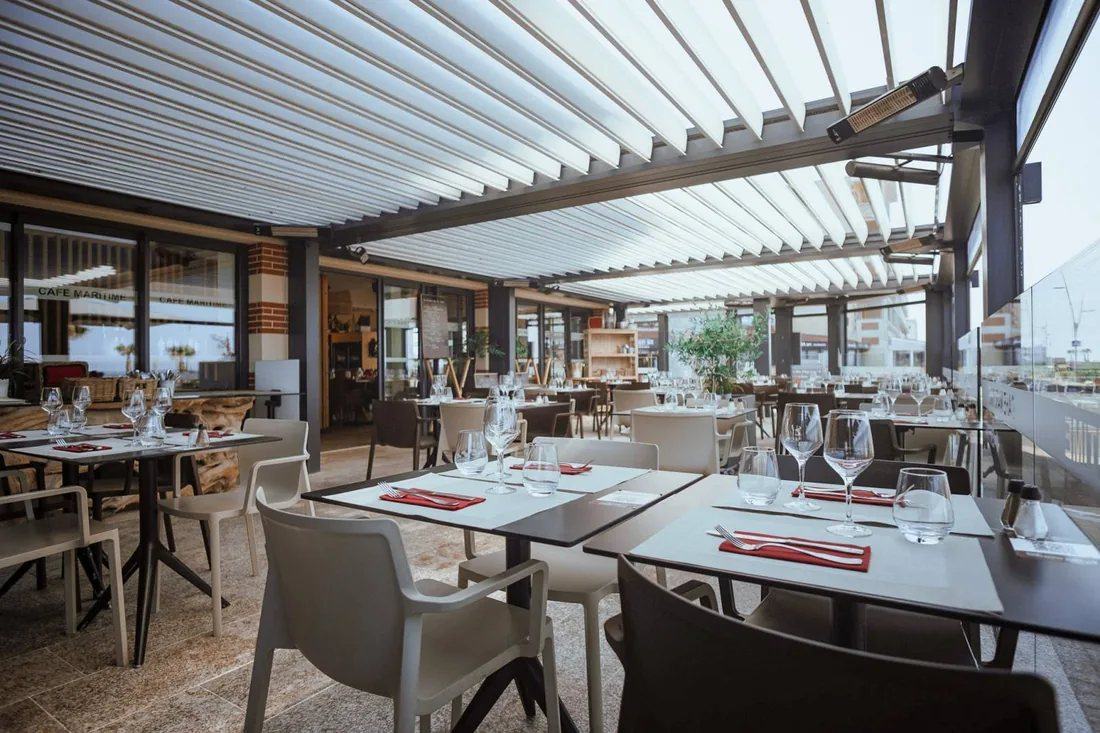 The terrace of Le Café Maritime facing the ocean, on the Lacanau Océan seafront